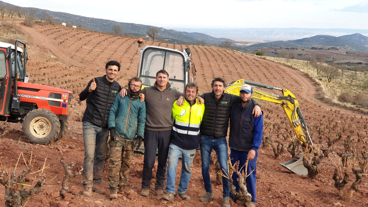 Equipo del trasplante con el tractor